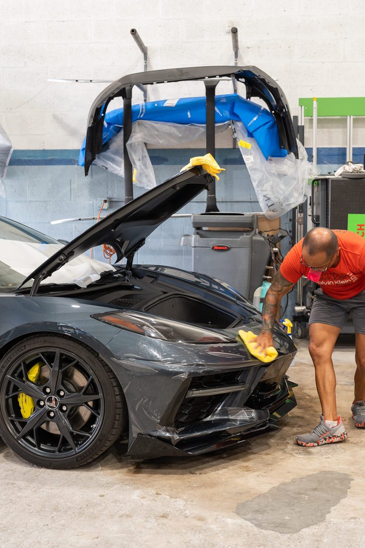 A Corvette in the shop during front-end work