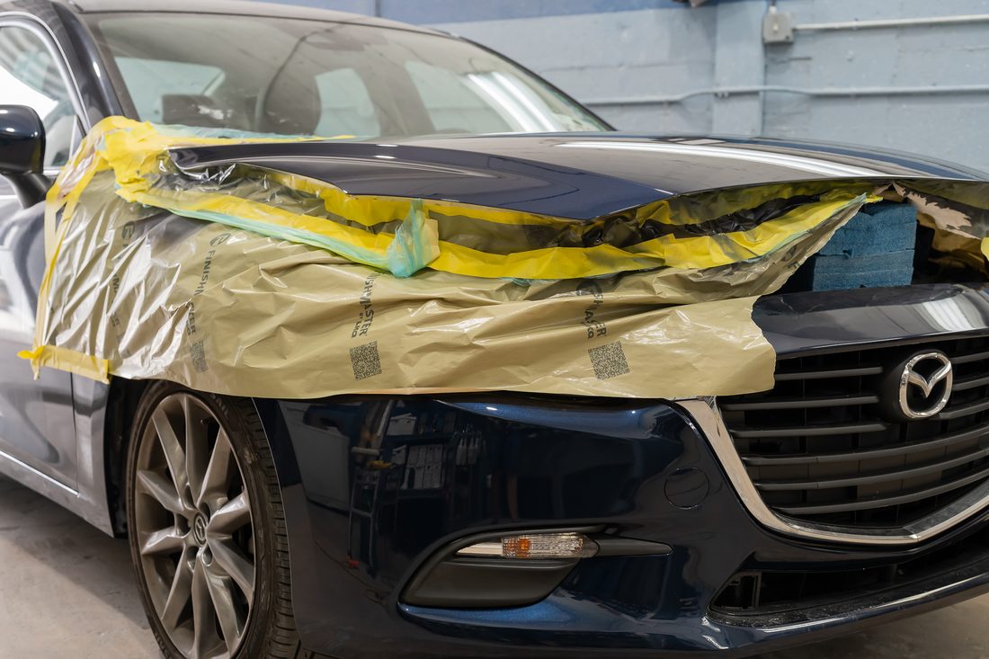 Masked edge work along the hood and headlamp line
