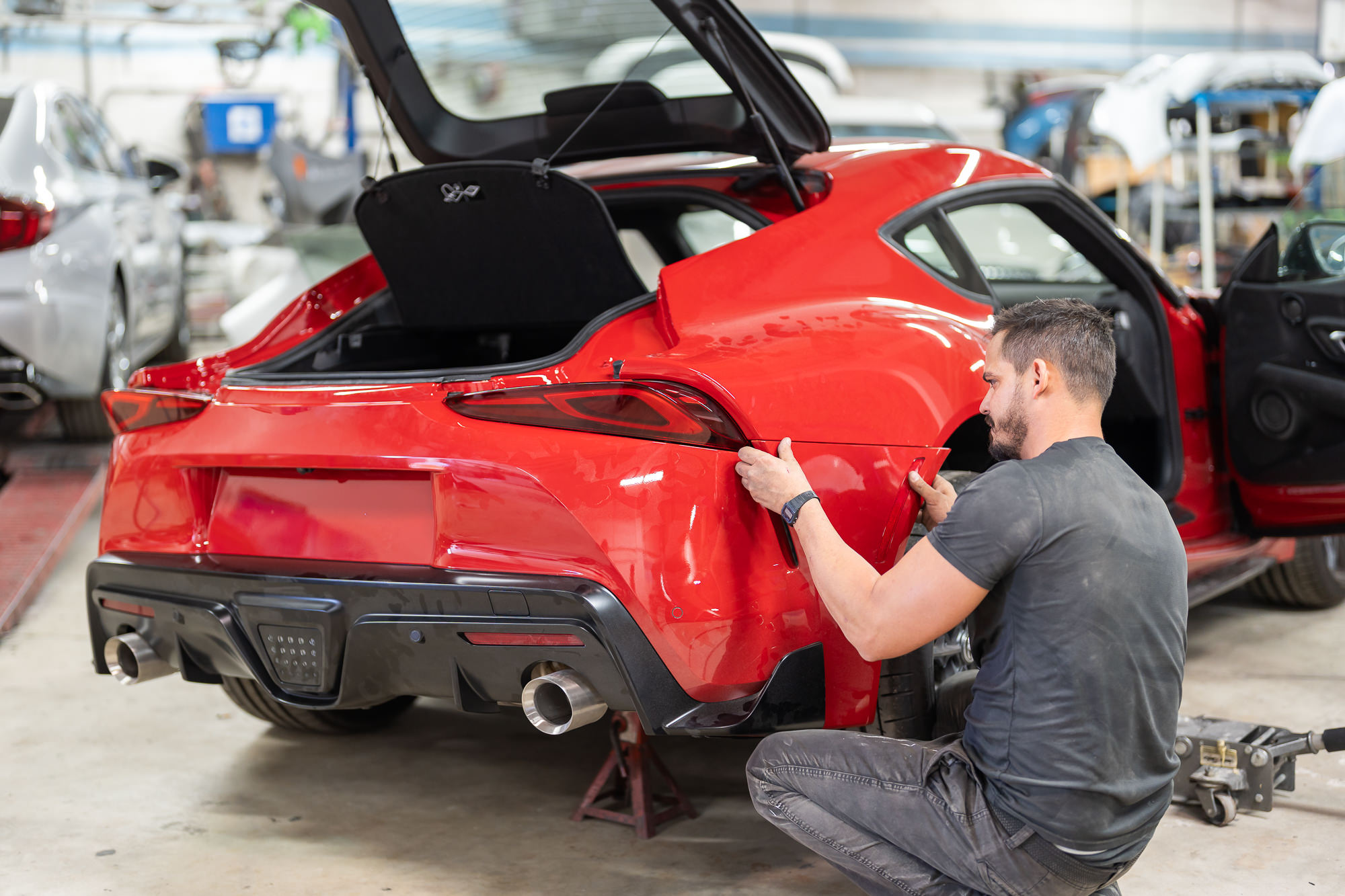 Major collision repair — vehicle front end disassembled